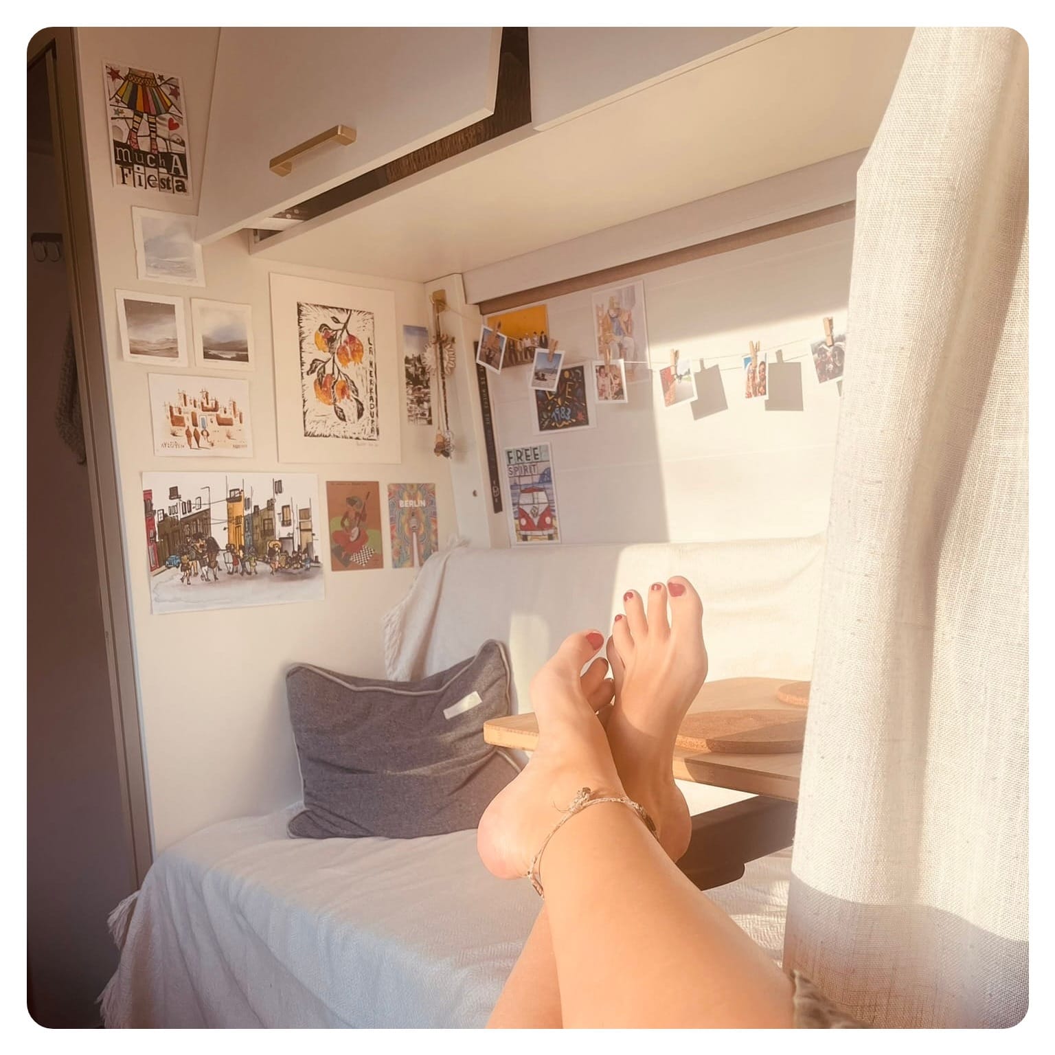 vanlavita woman with feet up on table side