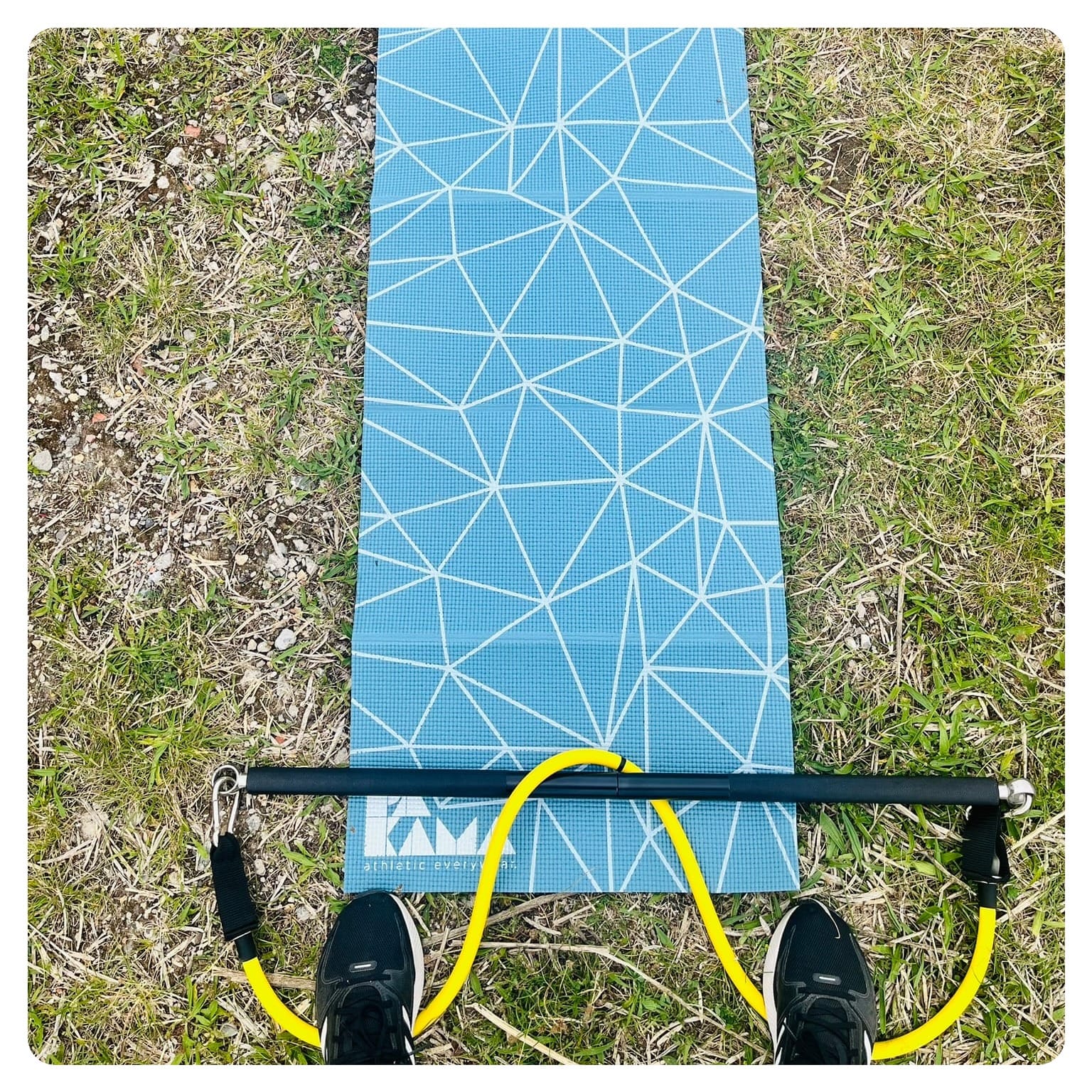 vanlavita woman with blue yoga mat and resistnace bands