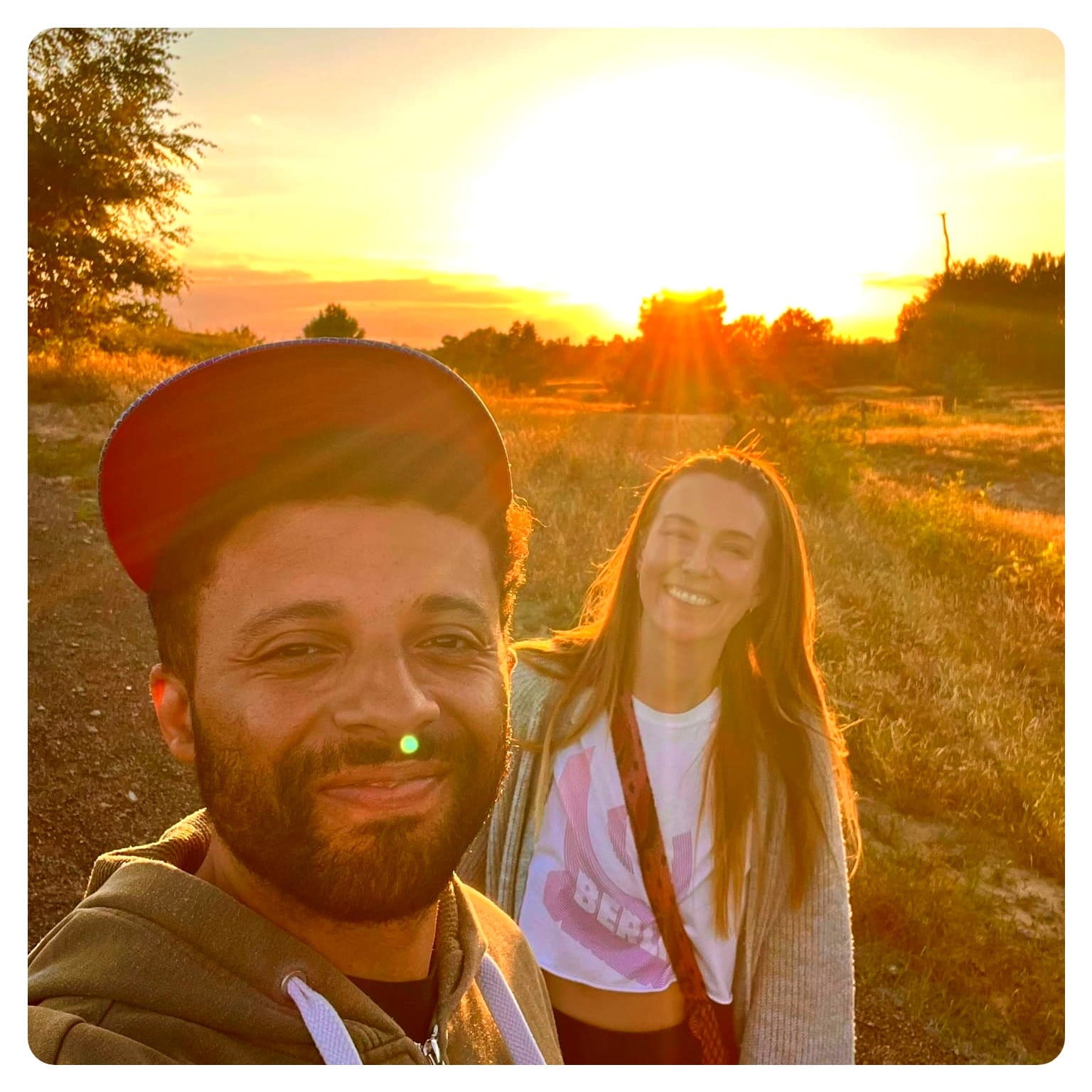 vanlavita man and woman with sunset at the Schonower Heide, Germany
