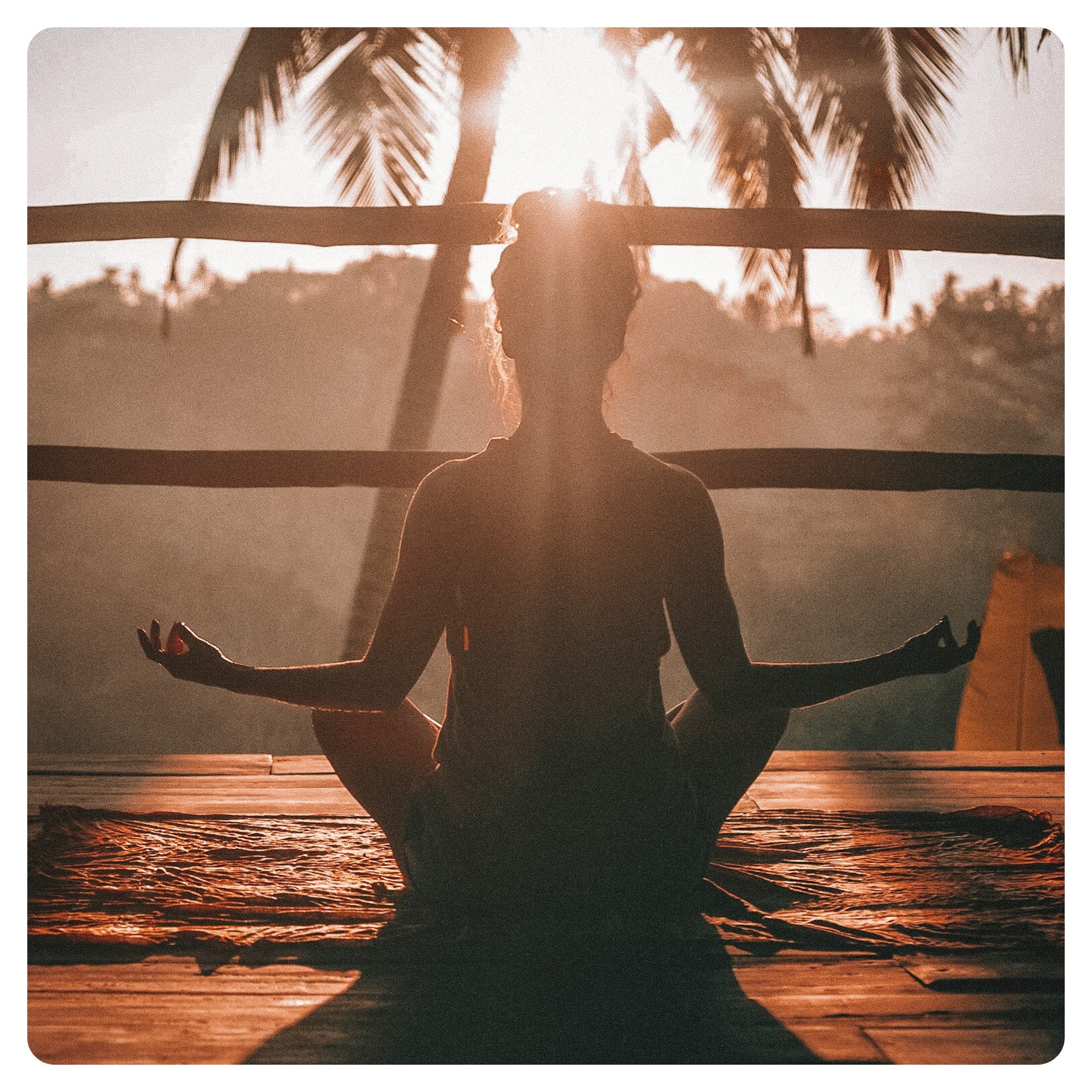 woman doing yoga meditation on brown parquet flooring
