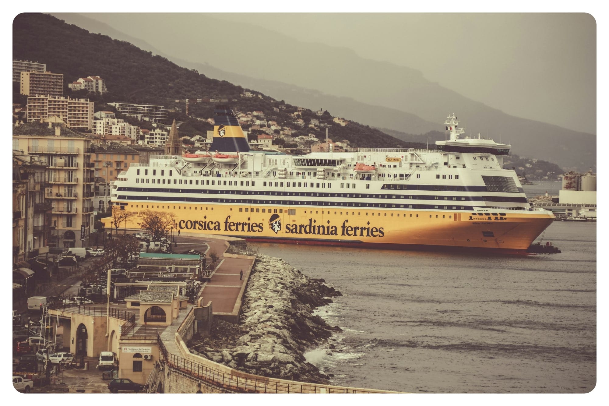 yellow and white cruise ship on body of water
