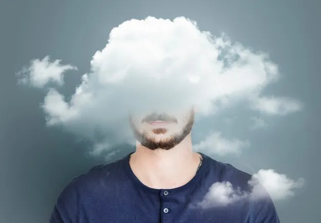 Hombre con nube frente a su cara para ocultar expresión facial.