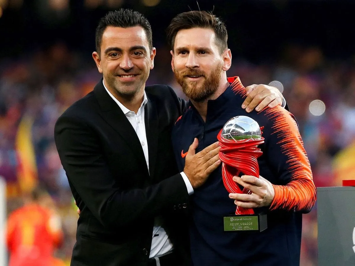 Xavi y Messi.
