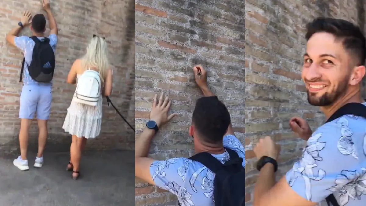 Graban a turista escribiendo su nombre y el de su novia en un muro del Coliseo Romano