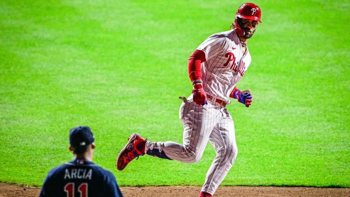 Bryce Harper y Orlando Arcia