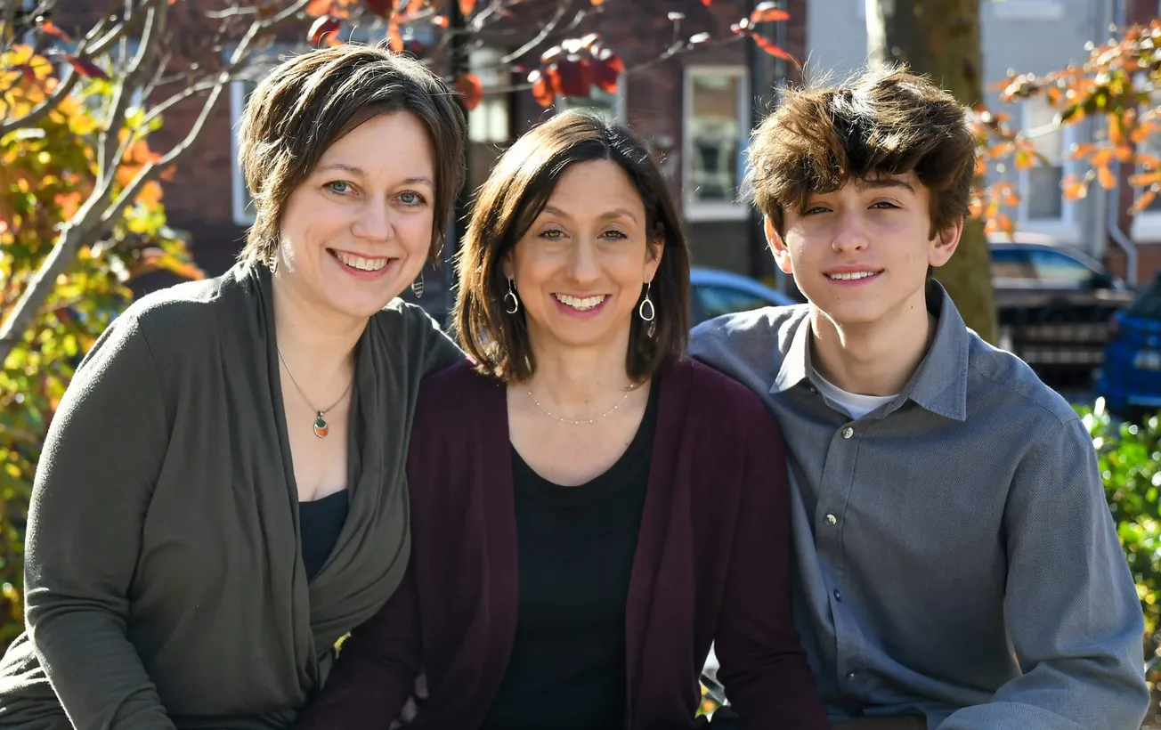 Rue Landau, con su familia