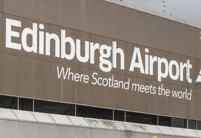 piloto arrestado pistola equipaje