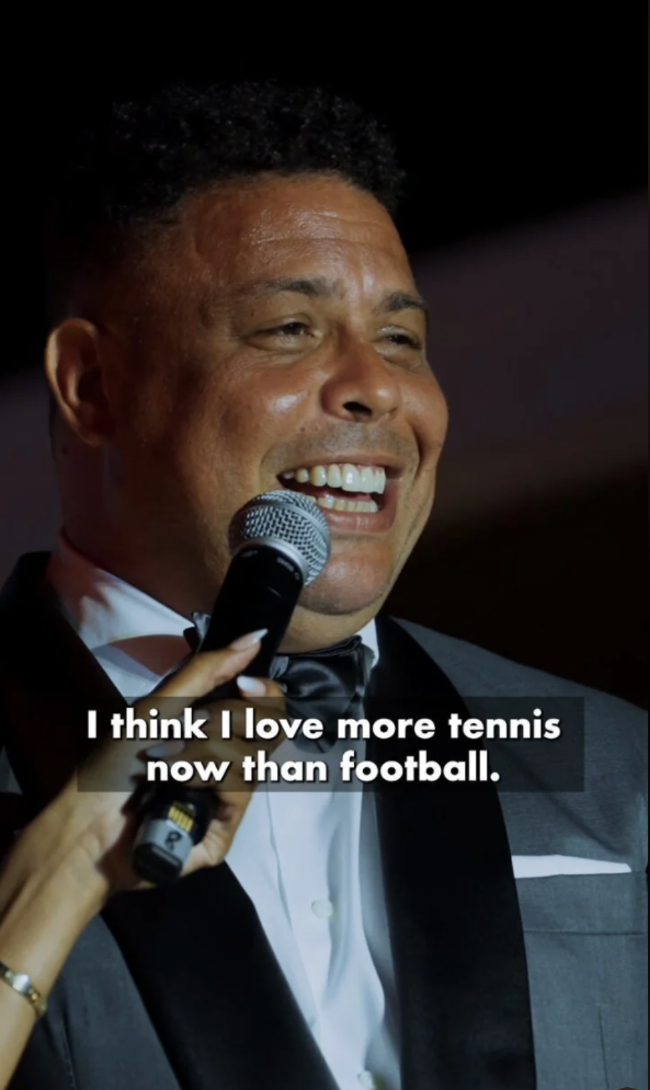 a photo of Brazilian ex-football player Ronaldo Nazário saying "I think I love more tennis now than football"