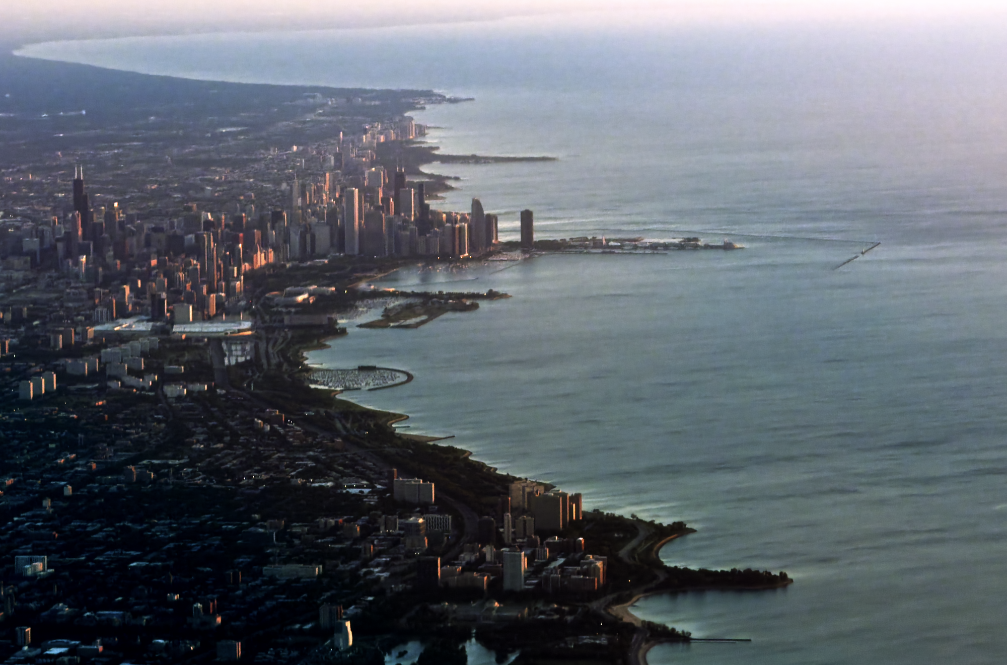 The view from a 737 to Chicago, taken with dusk light over the city from the south side of the city facing north.