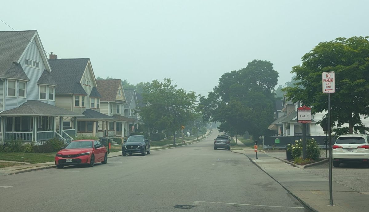 A street in Lakewood Ohio, visibly hazy from Canadian wildfire smoke.