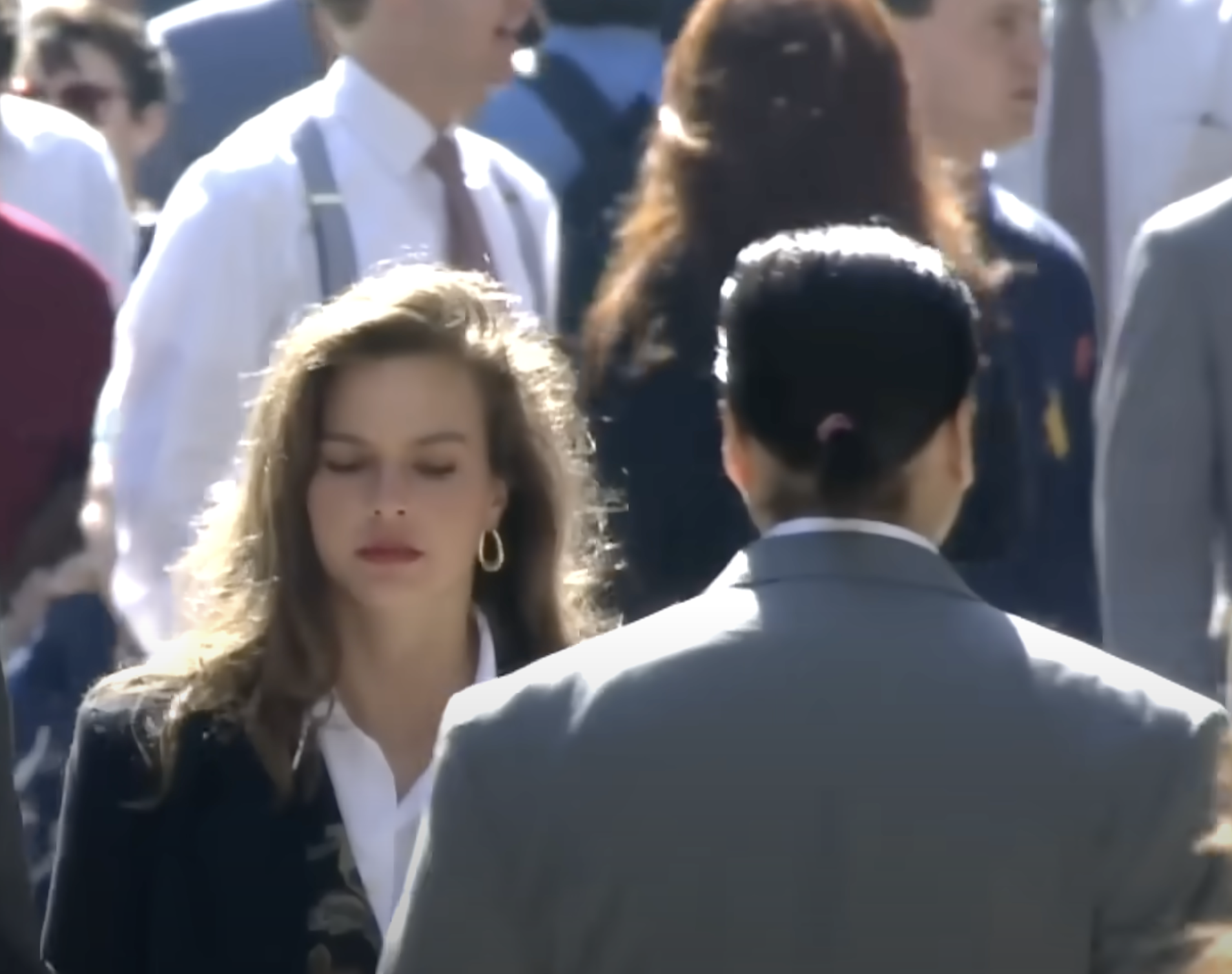 She's doing what women have to do in this patriarchal world - avoiding eye contact and just making sure she's not sending any signal whatsoever that she wants this creep's attention. I wonder if it'll work.