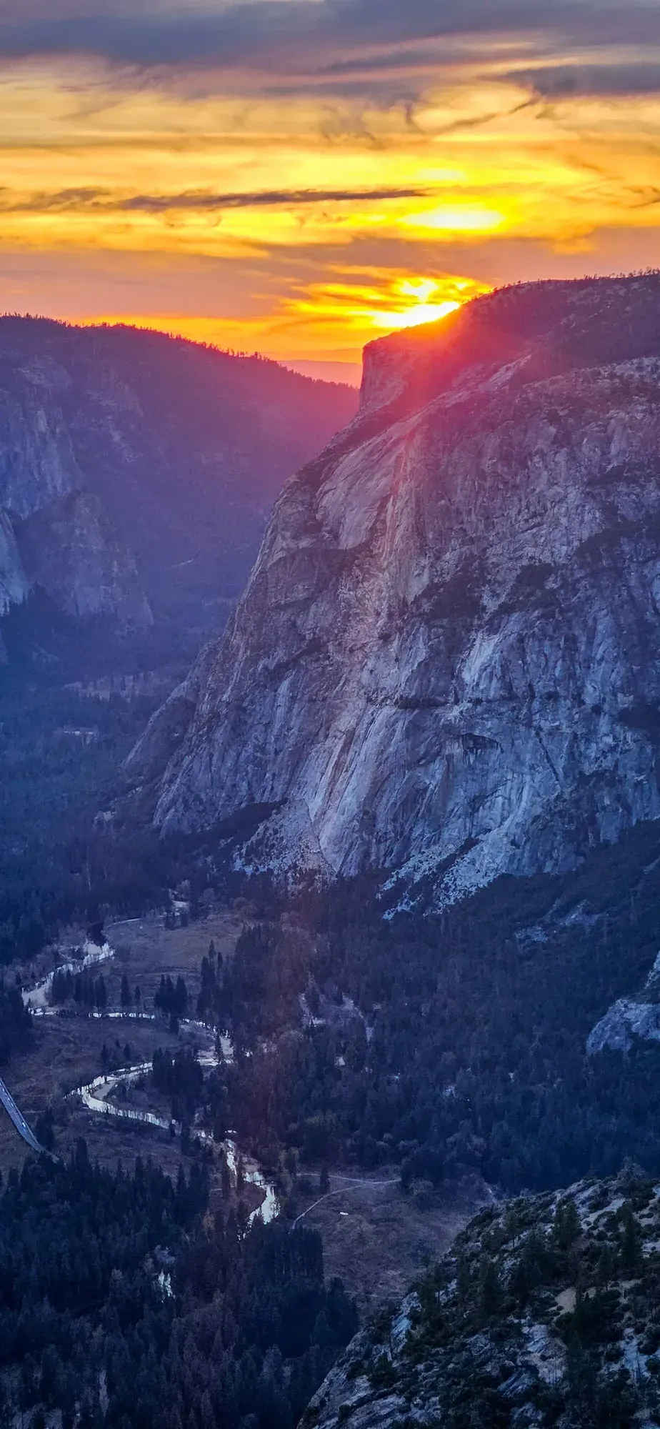 Sunset view over Half Dome and Yosemite Valley from North Dome, showcasing the granite wilderness terrain of guided backpacking trips