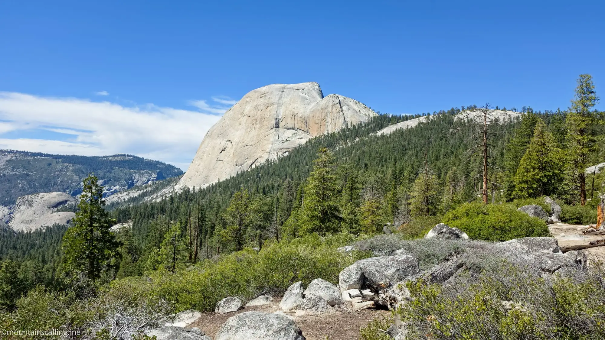 Granite dome and forested valley views along the Clouds Rest backpacking trail in Yosemite