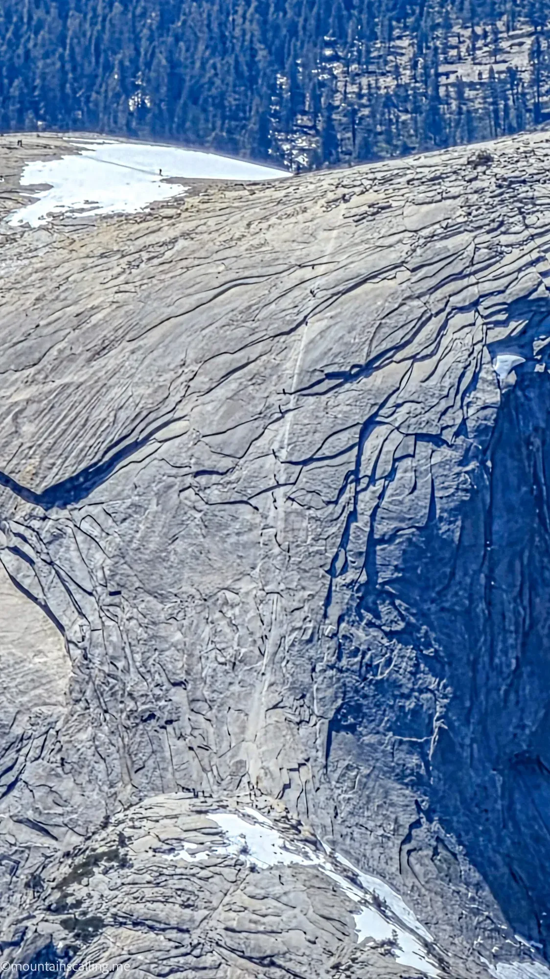 Half Dome cables route and granite surface detail visible from Clouds Rest backpacking approach