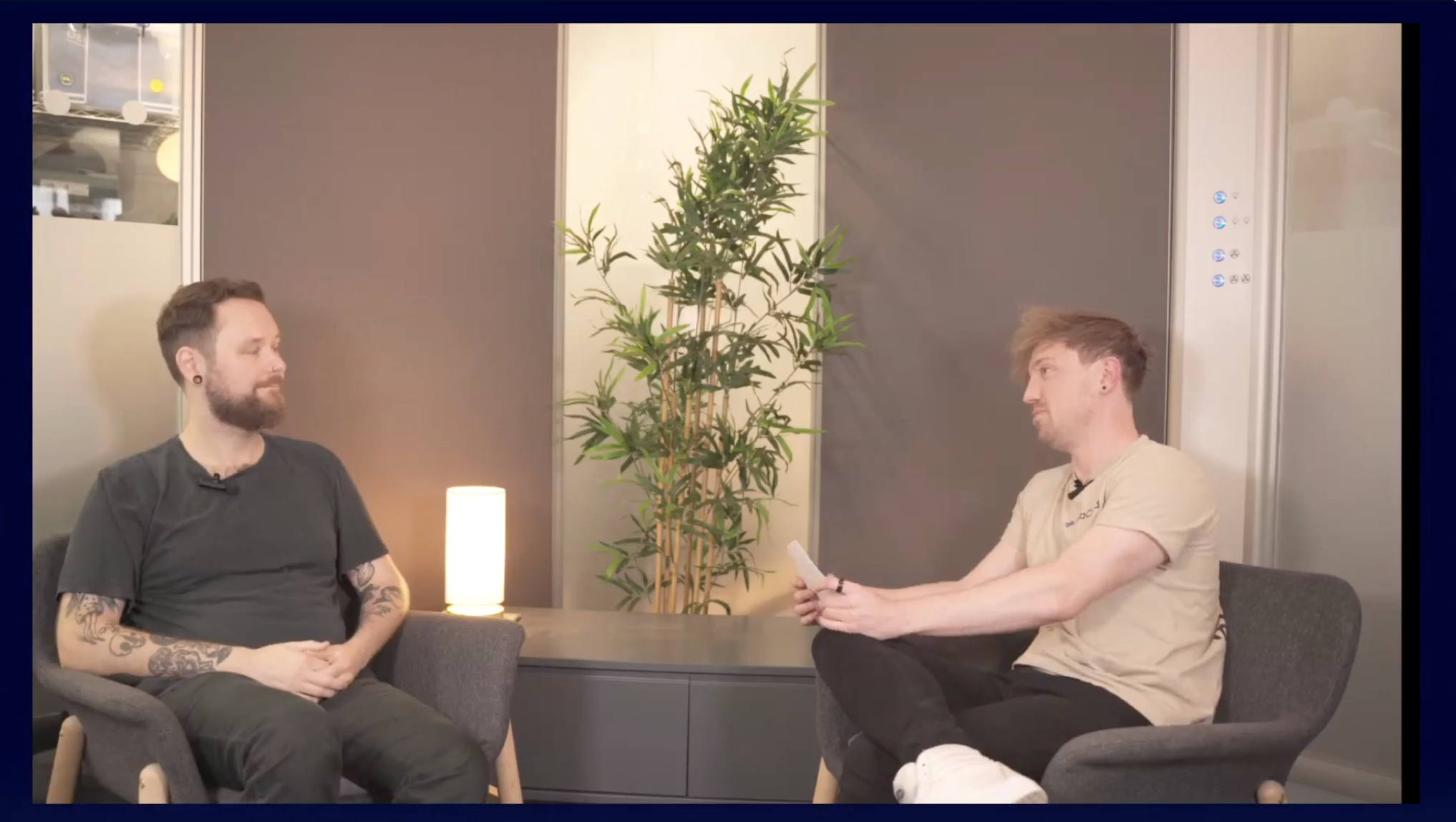 Still from a webinar that shows two people in discussion