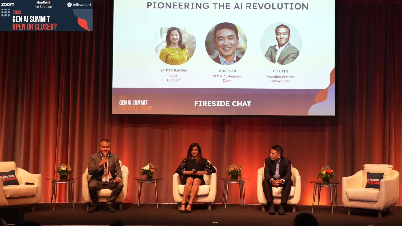 Image of people on stage during a fireside chat