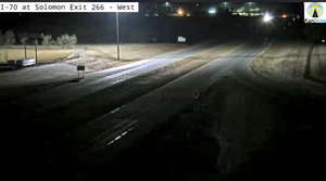 I-70 East Of New Cambria Partially Covered With Snow (6:27 am)