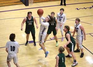 Southeast of Saline Boys beat Chapman 73-25 (Photo Gallery)