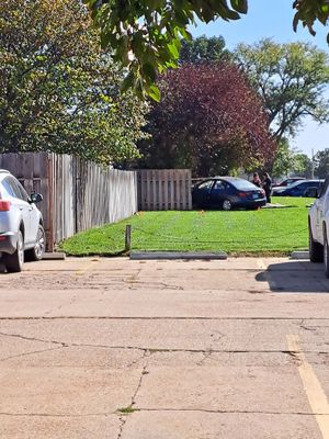 Vehicle Jumps Curb & Drives Into Fence