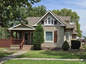 Spacious 4-Bedroom Home with Dual Garages on Corner Lot – $175K