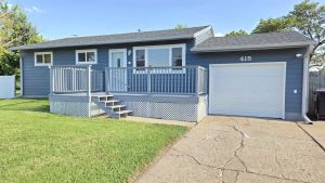 Charming Renovated 4-Bedroom Home with Large Backyard and Deck – $214,000