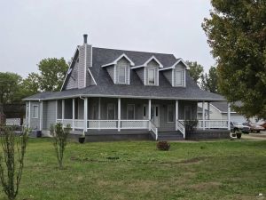 Home of the Day: Country Acre with 7-Car Shop & Wraparound Porch, 4377 N Sandy Ave