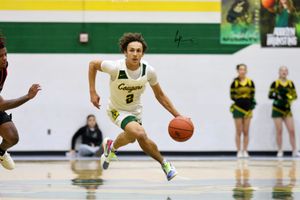 Cougars Win in Overtime 61-59 (Photo Gallery)