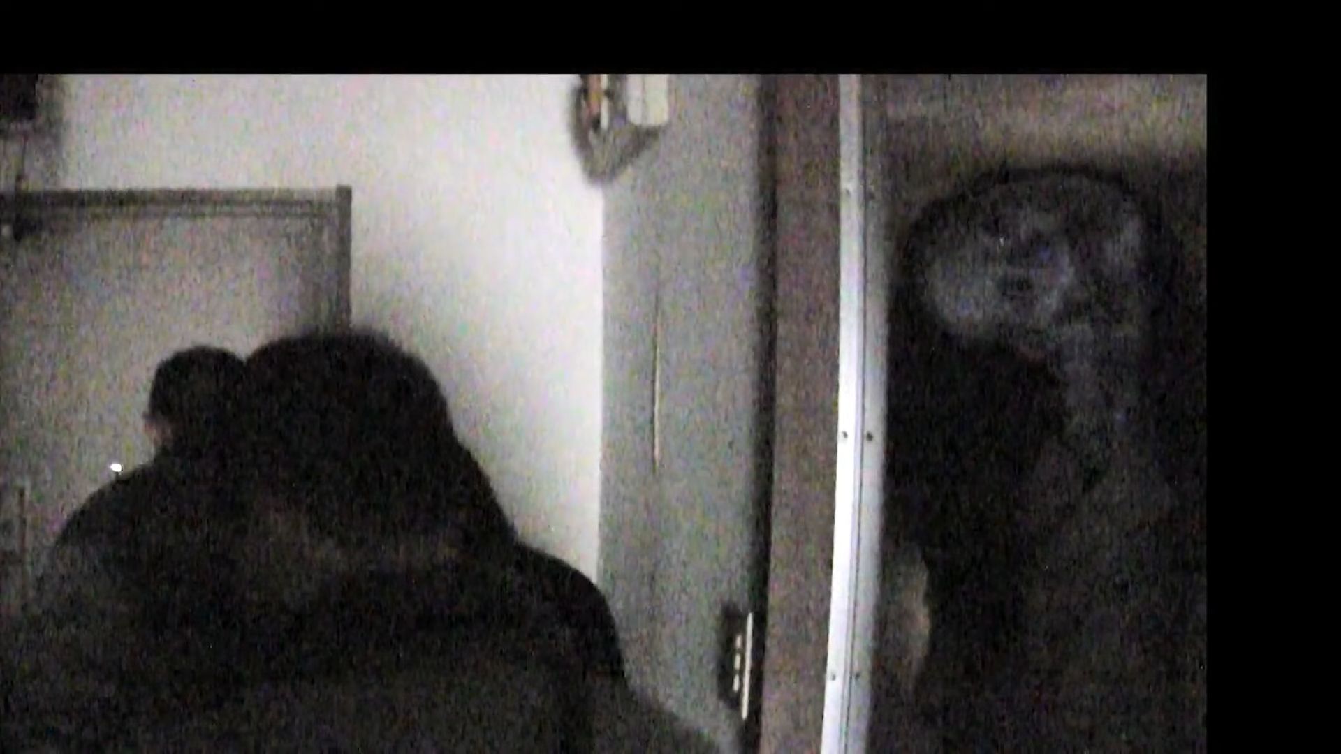 giant slit mouthed woman behind door