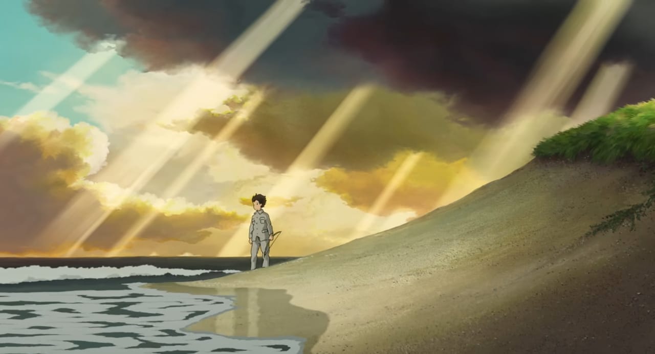 mahito stands on beach