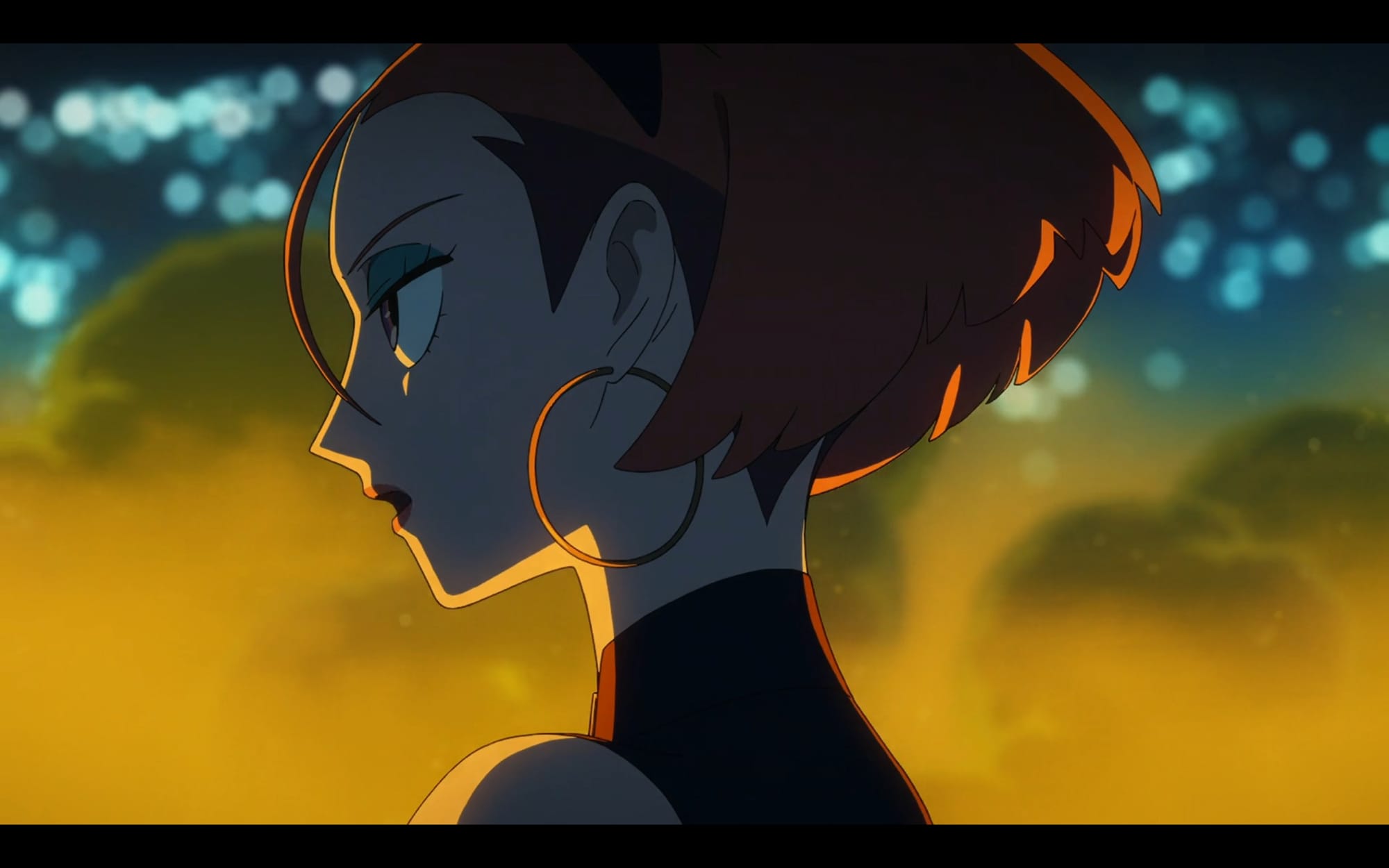 woman with big hoop earrings. yellow smoke and city lights can be seen in the background.