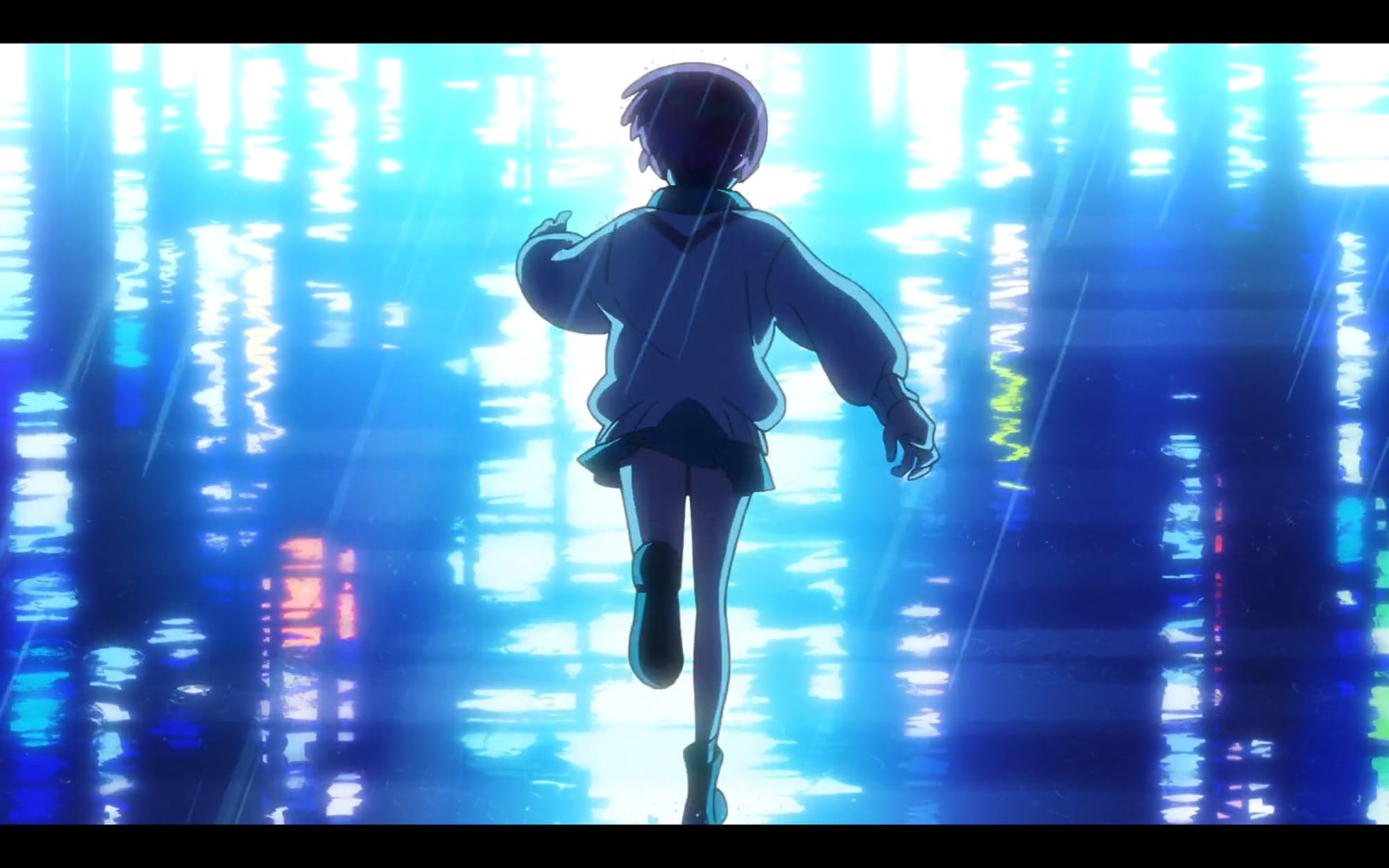 machu runs through the rain, illuminated by city lights.