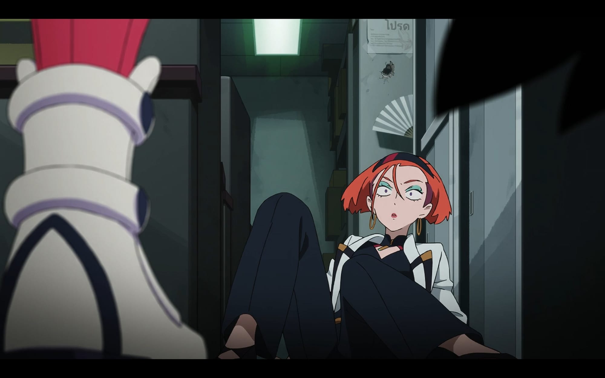 a shocked annqi lies on the ground