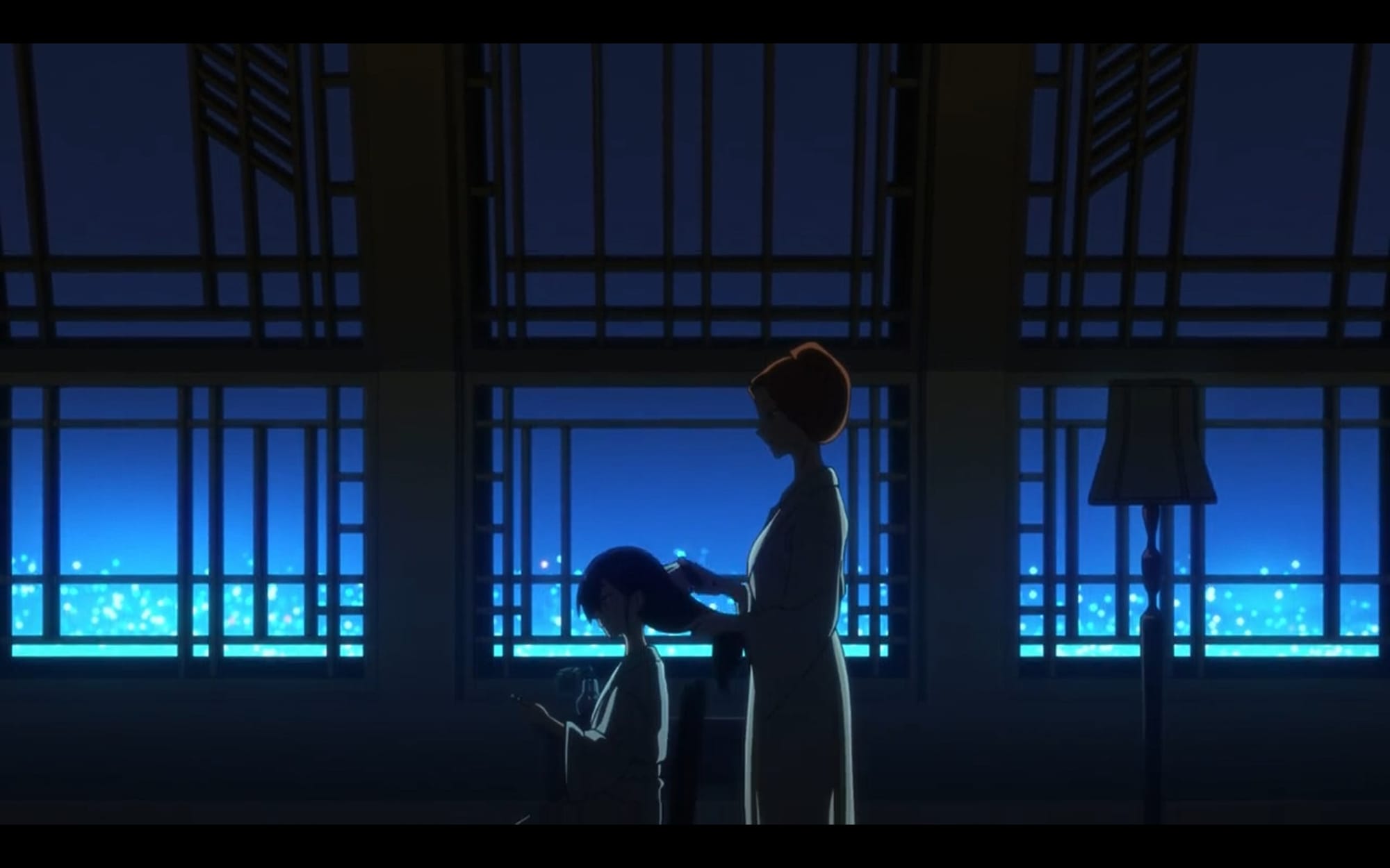 kycilia brushes nyaan's hair against dark blue skies and window grates