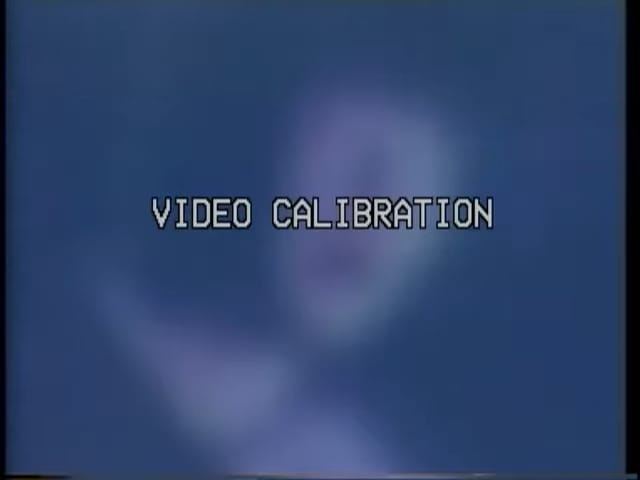 the blurry face of a woman, over which the text "video calibration" is superimposed.