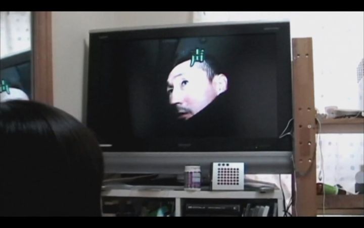 girl watches kudo on tv