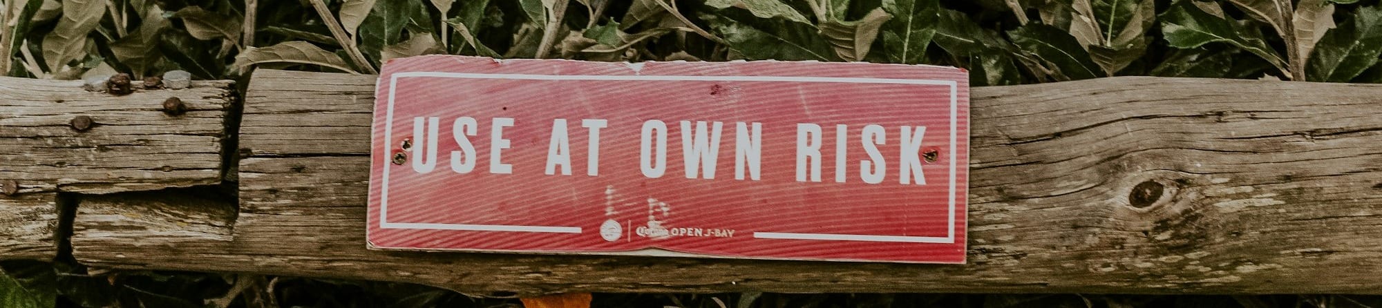 red and white wooden signage