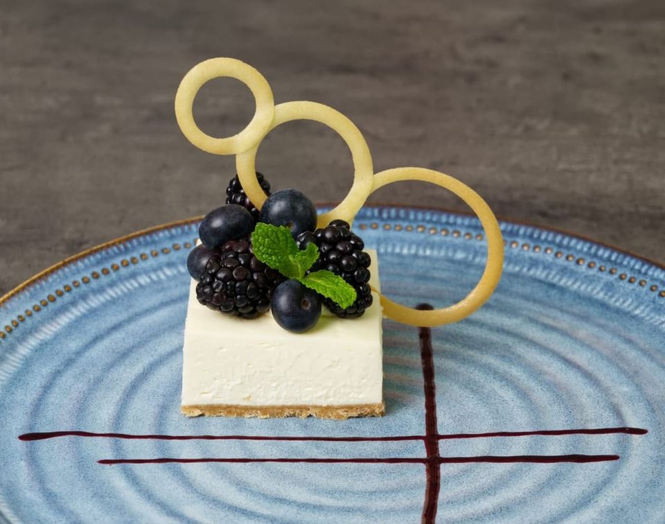 Velvet Vanilla Cheesecake Served With Dark Berries