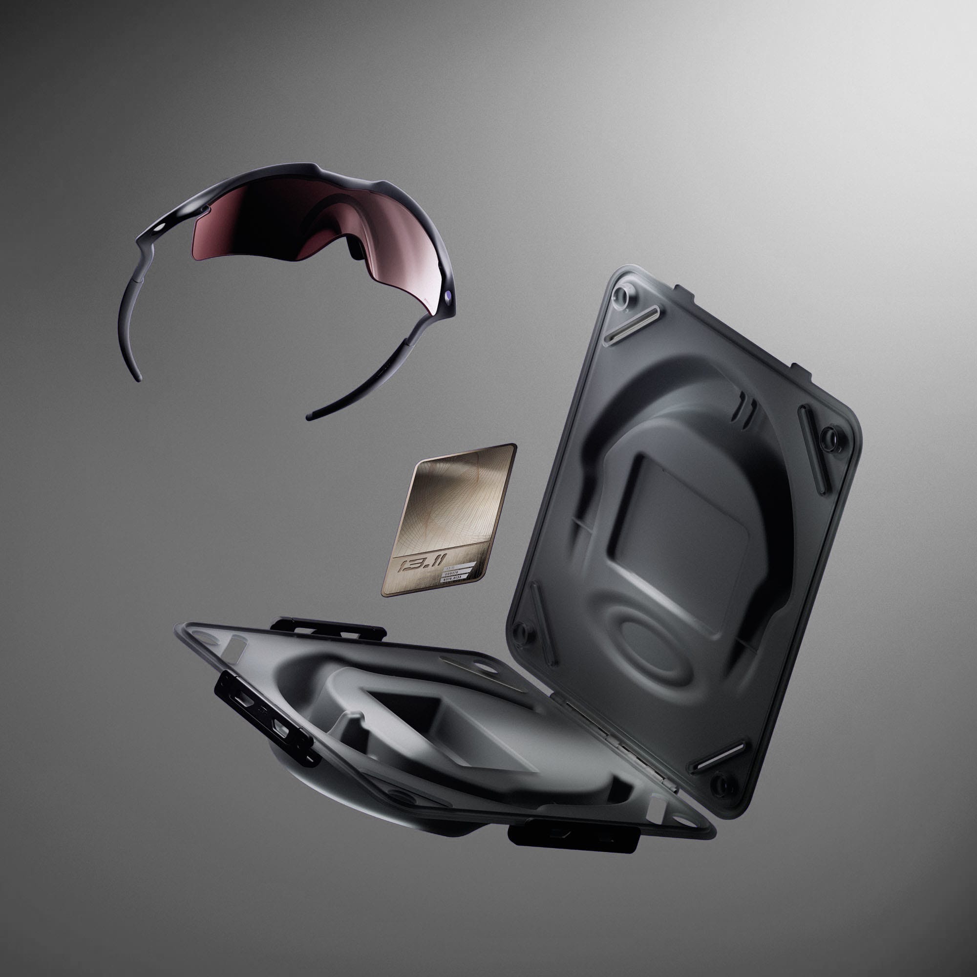 OAKLEY 13.11 MATTE FOG W/ PRIZM ROAD BLACK SUNGLASSES and its custom-engineered form-fitting hard case product still.