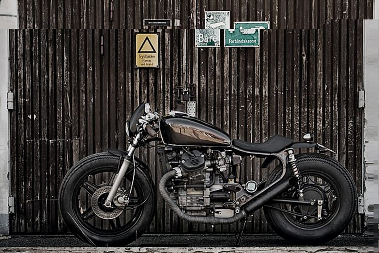 Honda CX500 by the Wrenchmonkees — custom cafe racer, side view.