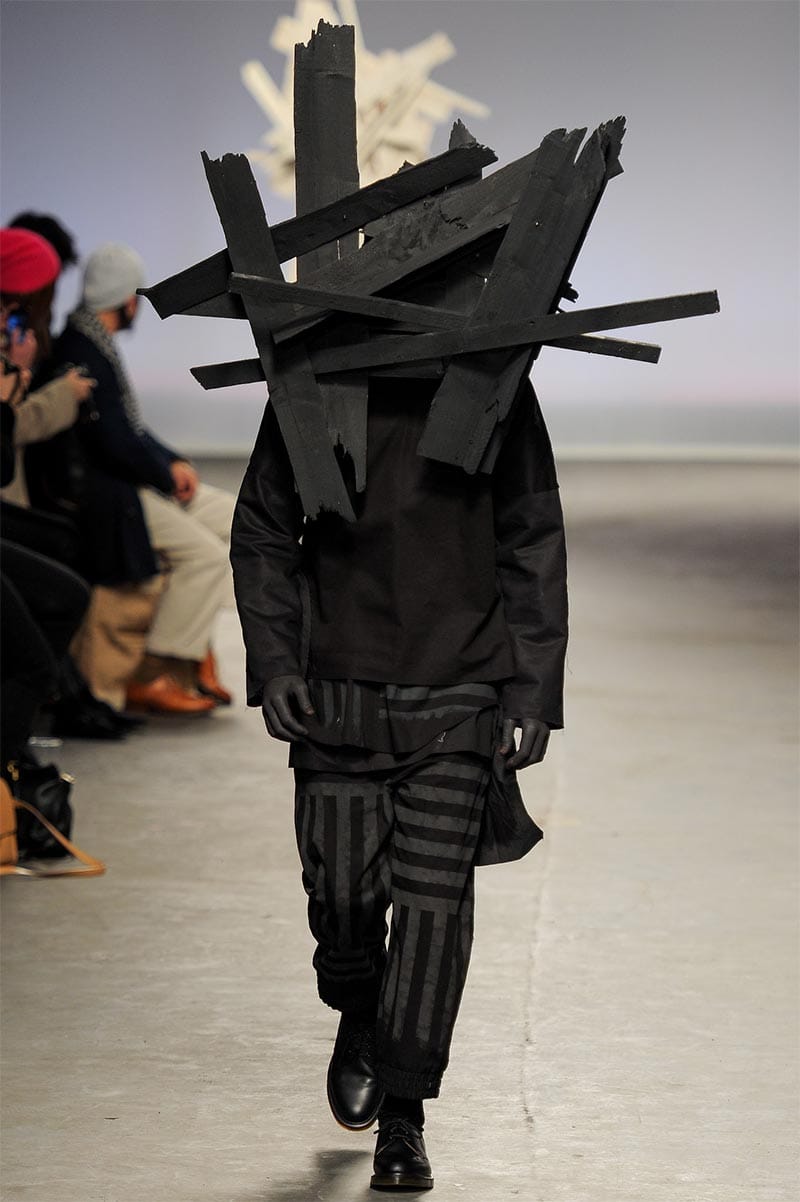 Craig Green FW2013 MAN look 16 — full monochrome layered look with vinyl-edged detailing and deconstructed wood plank crown