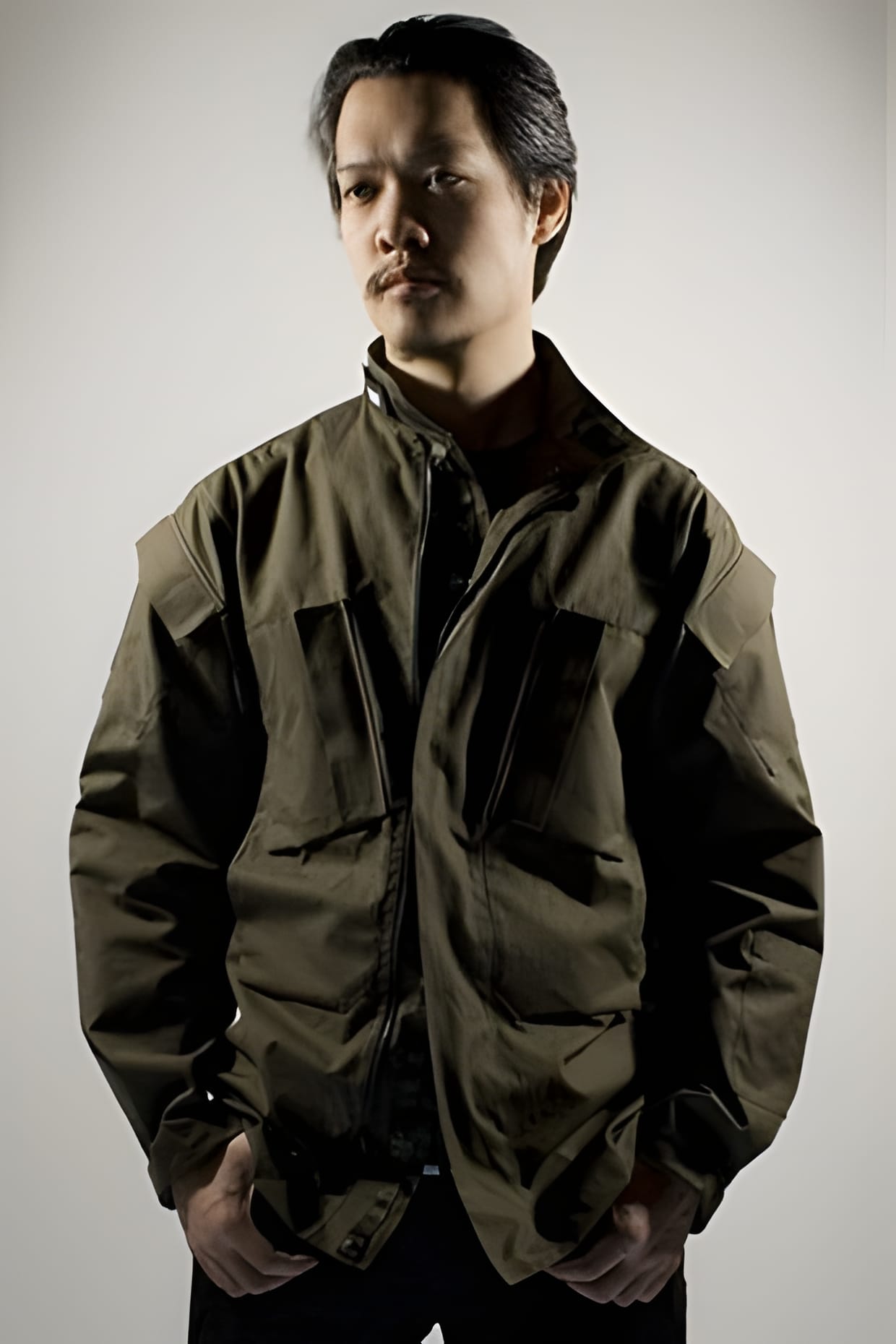 ACRONYM 2009 Fall/Winter olive field jacket worn, front view.