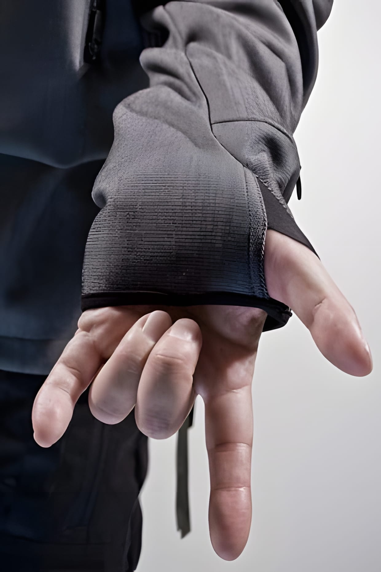 ACRONYM 2009 Fall/Winter grey softshell — thumb-hole glove cuff detail.
