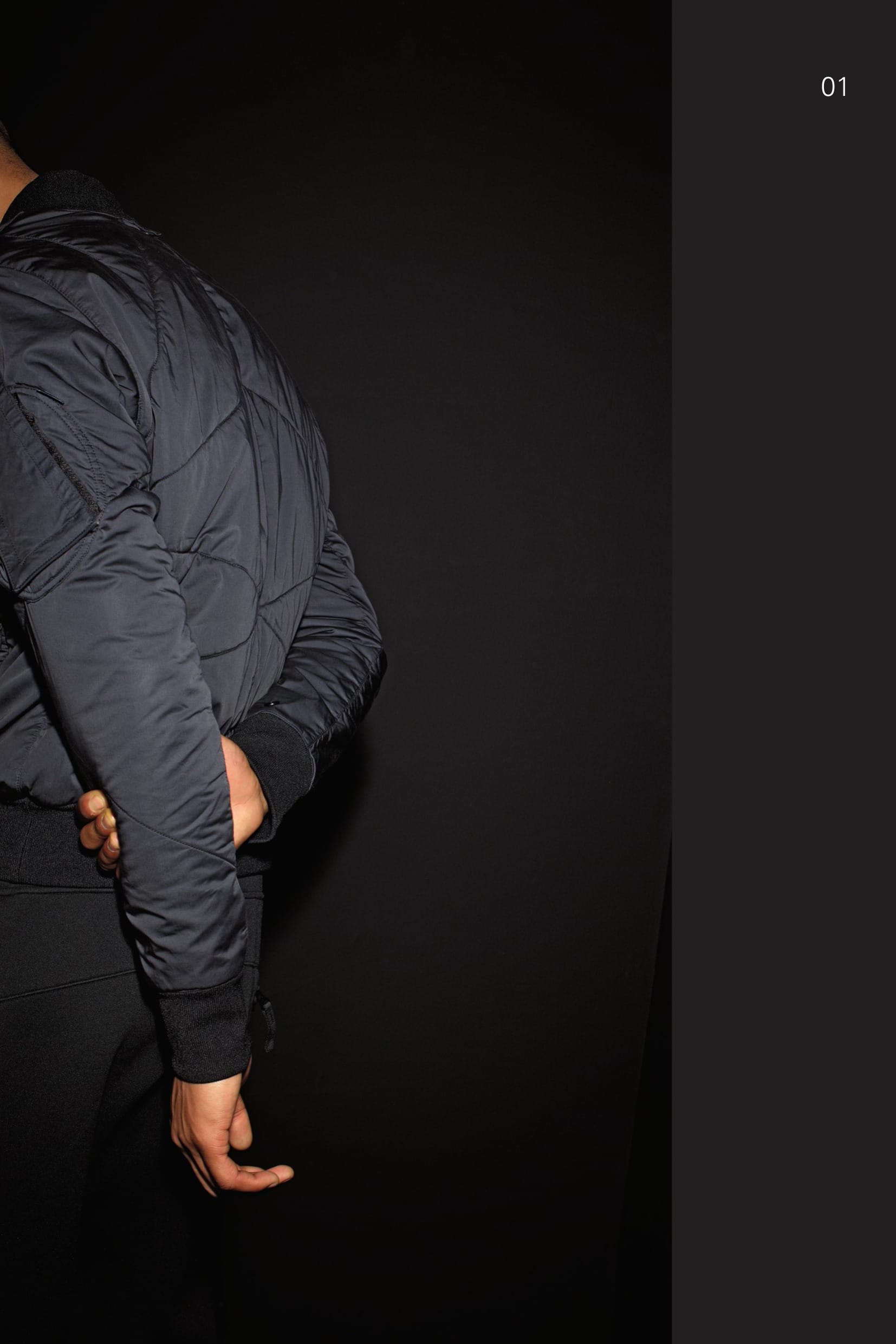 40510 CATEGORY_AUGMENT_MODULAR_INSULATOR JACKET_NYCO SATIN Bomber jacket in padded and quilted satin weave cotton / nylon. The Augment function allows the garment to be worn on its own or under other STONE ISLAND SHADOW coats and jackets in order to increase the system thermo performances. Two pockets in the front seams with invisible zip fastening. Round pocket with two small patch pockets on the left arm with zip fastening and rectangular flap fixed with Velcro®, which holds the STONE ISLAND SHADOW badge. Sleeve construction with lower gusset to allow maxi- mum freedom of movement. Stretch ribbed nylon bottom hem, collar and cuffs. Garment dyed. 30309 CATEGORY_SKIN CONTOUR PANT_NYCO FELPA Joggers in double face jersey, nylon outside and cotton inside. Two diagonal front pockets with pull-up zip fastening. Slightly diagonal back pocket with zip fastening. Panel construction on the legs. Drawstrings on bottom hems. Finely ribbed nylon jersey band with internal elastic band and drawstring at the waist. Flap with hidden button fly on the front. Garment dyed.