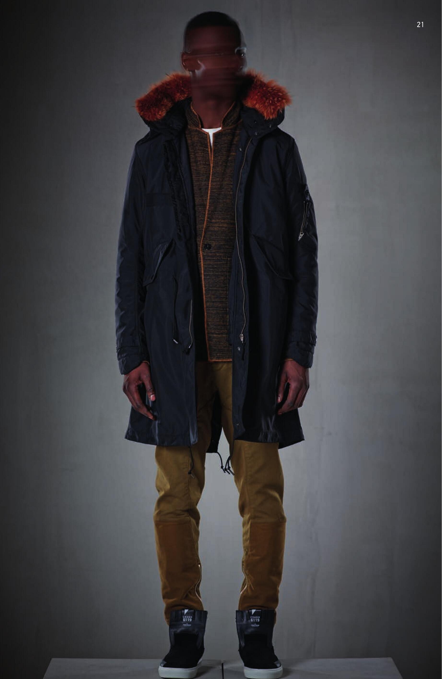 70405 FISHTAIL PARKA _ DIAGONAL PL Fishtail parka in shiny diagonal weave polyester. Garment dyed at 130°C. Large detachable hood with detachable fur trimming, lined in a slightly padded and star shaped quilted microfiber. Two diagonal pockets with flap and hidden snap fastening. Zip-fastening pocket on one sleeve: the pocket partially covers the Stone Island Shadow Project badge. Air vent under the sleeve. Shaped cuffs with snap adjustable strap. Drawstring waist. The parka can be shortened through inner snaps. Drawstring on bottom hem. Lined in a slightly padded and star shaped quilted microfiber. Zip and snaps fastening.