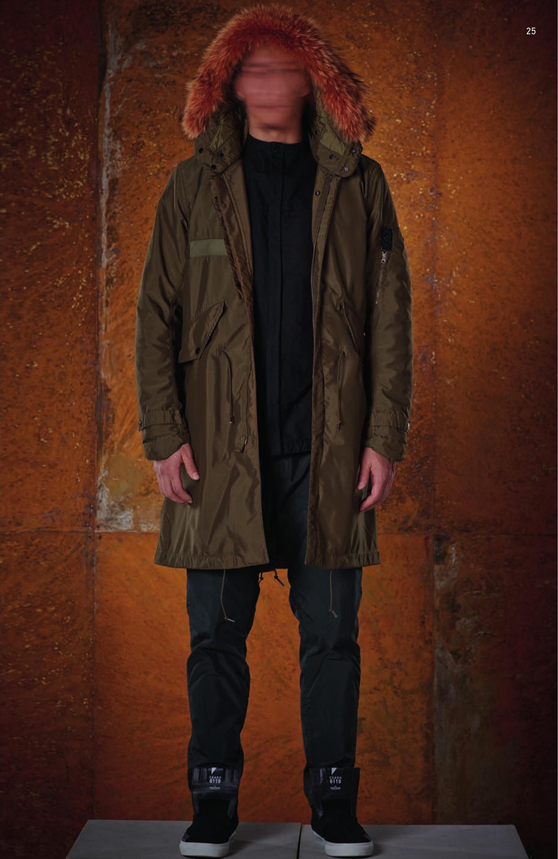 70405 FISHTAIL PARKA _ DIAGONAL PL Fishtail parka in shiny diagonal weave polyester. Garment dyed at 130°C. Large detachable hood with detachable fur trimming, lined in a slightly padded and star shaped quilted microfiber. Two diagonal pockets with flap and hidden snap fastening. Zip-fastening pocket on one sleeve: the pocket partially covers the Stone Island Shadow Project badge. Air vent under the sleeve. Shaped cuffs with snap adjustable strap. Drawstring waist. The parka can be shortened through inner snaps. Drawstring on bottom hem. Lined in a slightly padded and star shaped quilted microfiber. Zip and snaps fastening. 10407 CONTOUR NECK SHIRT _ OXFORD CO Round neckline shirt in oxford cotton. Squared cut. Yoke on front and back. Small chest pocket with opening in the front yoke. Wide sleeves. Buttons at cuffs. Adjustable elasticated band in the bottom seam. Hidden buttons fastening. Garment dyed. 30105 HIGH WAISTED CHINO _ DIAGONAL PL Chino trousers in shiny diagonal weave polyester. Slightly high waist cut. Vertical opening pockets parallel to the dart. Horizontal opening back pockets, inserted into the yoke. Zip fastening. Garment dyed under pressure at 130°C.