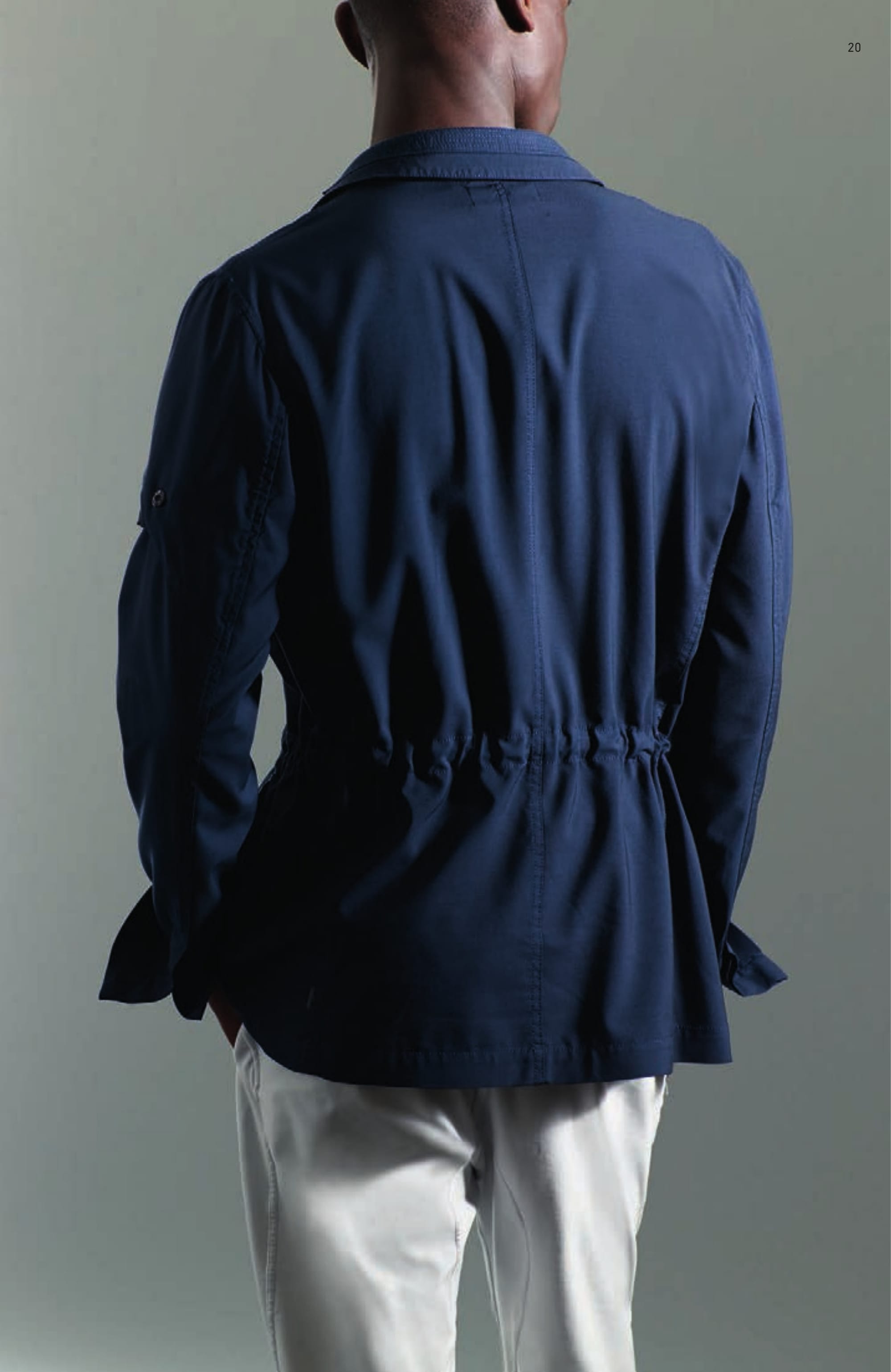 A0405 SB DRAWCORD BLAZER _ COATED WOOL Single breasted hybrid blazer in light wool gabardine, lightly pigment coated on the inside to give body to the fabric and achieve a two-colour effect. Collar with overstitched panel in the same fabric. Notched lapels with squared indents. Vertical fitting seams on front. Slanting front pocket. Chest pocket. Drawcord at waist. On the left sleeve, partly concealed Stone Island Shadow Project badge. Concealed buttons at cuffs. Three buttons fastening. 502A3 POLO _ CO PIGMENT DYE Long sleeve Polo shirt knit in light cotton crêpe. Garment dyed and subsequently over-dyed with natural pigments to achieve a deep and iridescent colour shade. Ribbed collar with two parallel raised lines and three buttons fastening. Zigzag motif on the ribbed cuffs. Ribbed inner bottom line. On the left sleeve, partly concealed Stone Island Shadow Project badge. 30312 CHINO _ 4 WAY STRETCH Chino/track pants in 4 ways stretch smooth heavy nylon. Garment dyed. Wide fit. One small pleat along vertical front pockets. Two back pocket. Seat inlay. Elasticated waist with drawstring. Zip and buttoned fastened fly. S0122 STEP-ON SLIP-ON 3 _ CANVAS / LEATHER / PONY HAIR Modular and versatile shoe. The back of the shoe, in heavy ribbed double layer nylon jersey transforms this deck-shoe into a slip-on shoe. Cotton canvas upper with leather and pony hair inlays. Oversized tongue carrying the CXADO heat print motif. White real rubber sole.