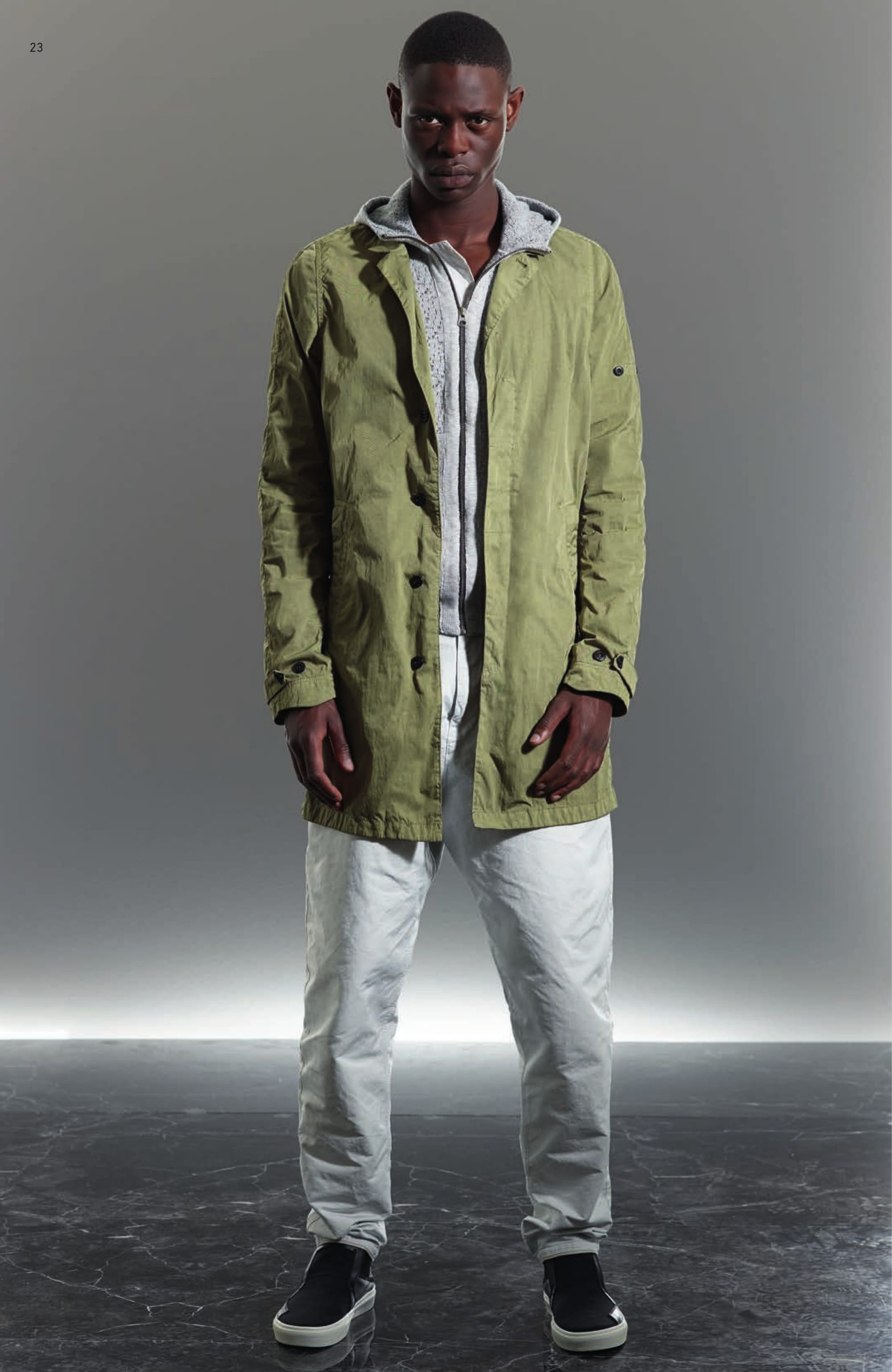 70102 CAR COAT _ HOLLOWCORE METAL Car coat in hollowcore nylon twill. Garment dyed. The high-density structure of HOLLOWCORE METAL fabric belies its surprisingly lightweight and comfortable hand. This effect is achieved by the use of hollow polyamide fibres, which provide substantial volume with minimal mass. When garment dyed, the special structure of the fabric results in incredibly vivid metallic colours and a deep iridescent sheen. Collar with small notched lapels. Slanting front pockets. Adjustable straps at shaped cuffs. Air vent under armholes. Shoulder yoke. Central back vent. Concealed button fastening. 505A2 ZIP HOODIE _ CO/PL/PA JACQUARD Hooded full zip knit in cotton/nylon/polyester yarns creating a mélange effect through garment dyeing. Stone Island custom made Jacquard stitching construction. Patch front pockets with diagonal opening. Ribbed cuffs and bottom band. Vertical raised profile on sleeves and central back. Zip fastening. 30203 WIDE PANT _ DAVID-C Pants in David-C. Garment dyed under pressure. Over-dyed cotton recipe. This historical Japanese star shaped cross section polyester/polyamide microfiber, is enriched by an inner diagonal cotton face coming directly from the loom. The high pressure 130°C garment dyeing procedure colours the polyester outer surface and transforms the hand of the material resulting in a unique tactile experience. After thoroughly washing the piece, a second dye bath over-dyes the inner cotton surface. This double dye procedure enables a wide range of tone on tone or highly contrasting colours. Wide fit, low crotch. Diagonal front pockets. Two back pockets with button fastening. Vertical fitting seam above back pockets. Leg bottom edge with tape edging. Drawstring at waist. Zip and button fastened fly. S0122 STEP-ON SLIP-ON 3 _ CANVAS / LEATHER / PONY HAIR Modular and versatile shoe. The back of the shoe, in heavy ribbed double layer nylon jersey transforms this deck-shoe into a slip-on shoe. Cotton canvas upper with leather and pony hair inlays. Oversized tongue carrying the CXADO heat print motif. White real rubber sole.