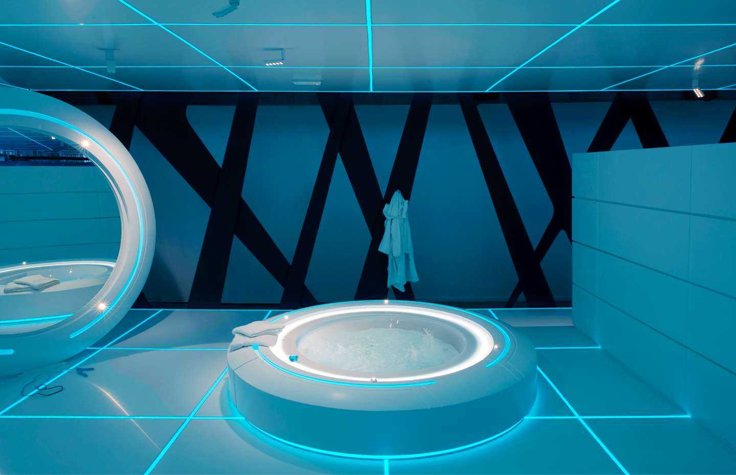 Illuminated ring wellness installation — TRON Designs by Marco Piva for DuPont Corian x Disney, Milan Design Week 2011