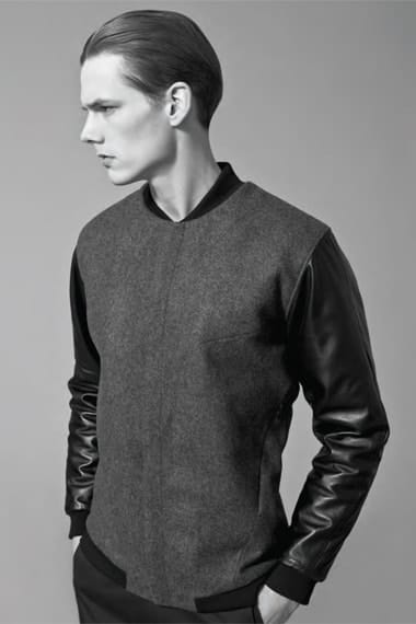 Johannes Niermann in a grey wool top with black leather sleeves from Stahl Corporation Fall/Winter 2012.