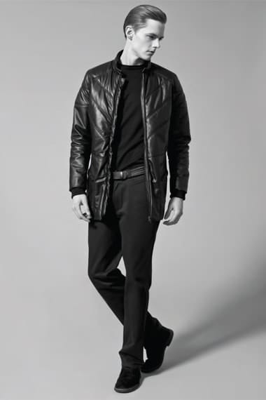 Johannes Niermann in a long black leather quilted jacket from Stahl Corporation Fall/Winter 2012.
